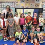 Ravalli County CU's Laci Rose teaching 1st graders about finances