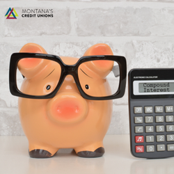 compound interest article image - a piggy bank and calculator